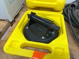 a yellow box with a black valve in it