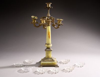 a candle holder that is sitting on a table