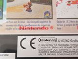 the back cover of a nintendo wii game with a picture of mario kart