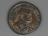 an old coin with a picture of a man on it