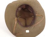 an image of a hat that is sitting on a white surface