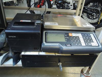 a calculator sitting on top of a table in a garage