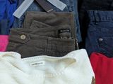 a pile of clothing that is sitting on a table