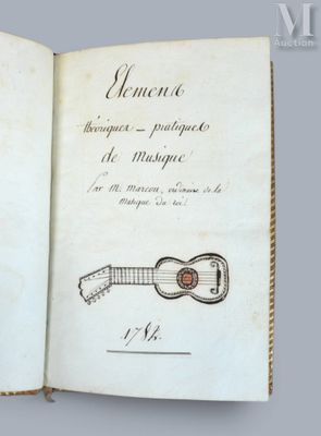 un livre ouvert sur lequel est dessiné une guitare