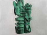 statue of a woman holding a baby in her arms