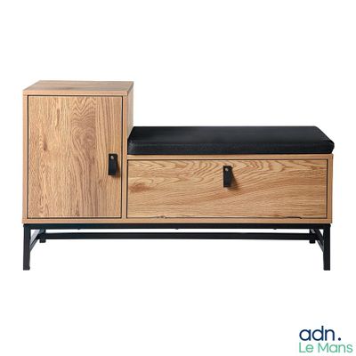 a wooden bench with a black cushion on top of it