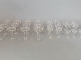 a lot of empty wine glasses on the table
