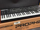 a box with a keyboard on top of it on a table