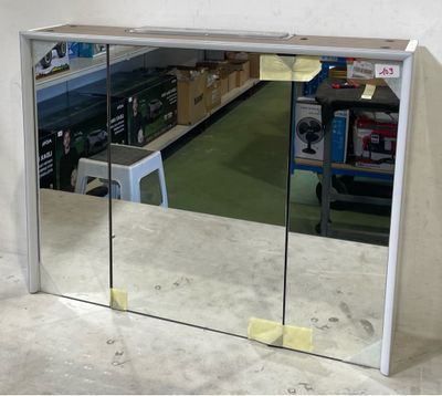 a mirror that is on the wall in a store