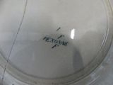 a close up of a plate with writing on it
