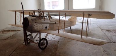 a small airplane that is sitting in the middle of a room