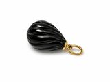 a close up of a black bead on a white background