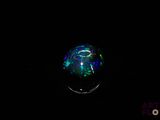 an oplite in the dark with a black background