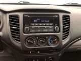 the dashboard of a car with a digital clock on the dash