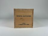 a close up of a wooden box with a label on it