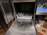 a stainless steel oven with a tray of food inside of it