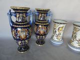 three vases are sitting next to each other on a table