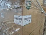a large box that is wrapped in plastic and sitting on a pallet