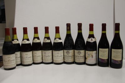many bottles of wine lined up on a table