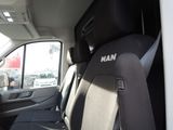the back seat of a truck with a man written on it