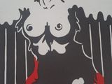 a picture of a picture of a woman with a devil on it