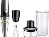 a blender and a glass with a whisk inside of it