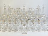 a lot of empty wine glasses on the table