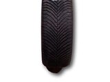 a close up of a car tire on a white background