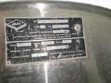 une photo d'une casserole en acier inoxydable sur laquelle est apposée une étiquette