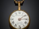 une montre de poche en or avec des chiffres romains