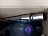 a box with a vacuum and other items inside of it
