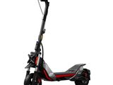an image of a scooter with a black seat and red wheels