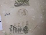 a plate with a label on it sitting on a table
