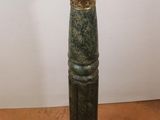 pedestal made of marble and brass with a green patina finish