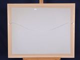 an easel with a white board and a black background