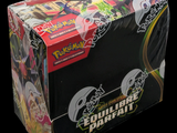 une boîte de cartes à collectionner Pokémon sur fond noir
