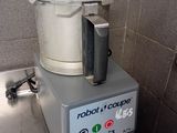 a blender sitting on top of a counter in a kitchen