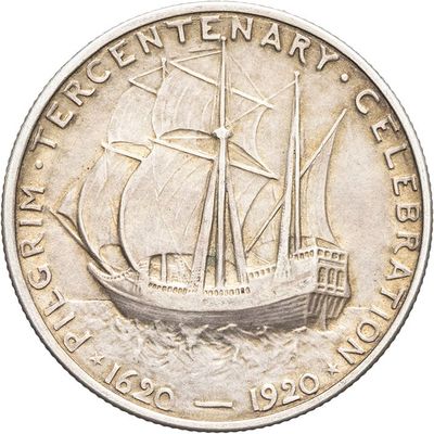 an image of a silver coin with a ship on it