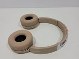 the sony headphones are sitting on the table ready to be used