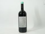 a bottle of wine that is sitting on a table
