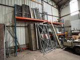 a lot of different types of metal items in a warehouse