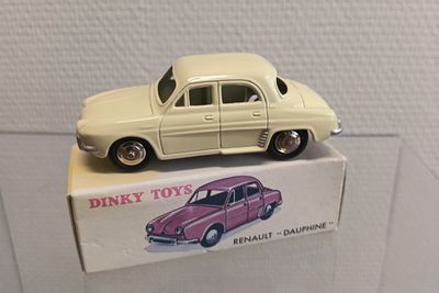 a small toy car on top of a box