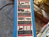 a picture of a blue table with a sign on it