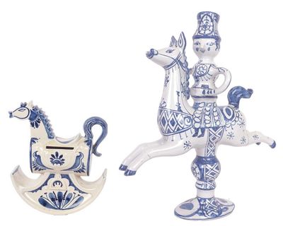 two blue and white figurines of a man riding a horse and a rocking horse
