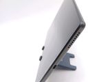 a close up of a tablet computer on a stand