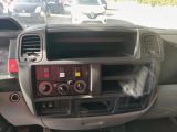 a dashboard of a car with a lot of buttons on it