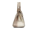 a close up of a handbag on a white background