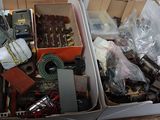 a box full of assorted items sitting on the floor