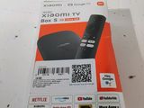 packaging of a box with a remote and a barcode on it
