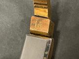 two gold bars stacked on top of each other
